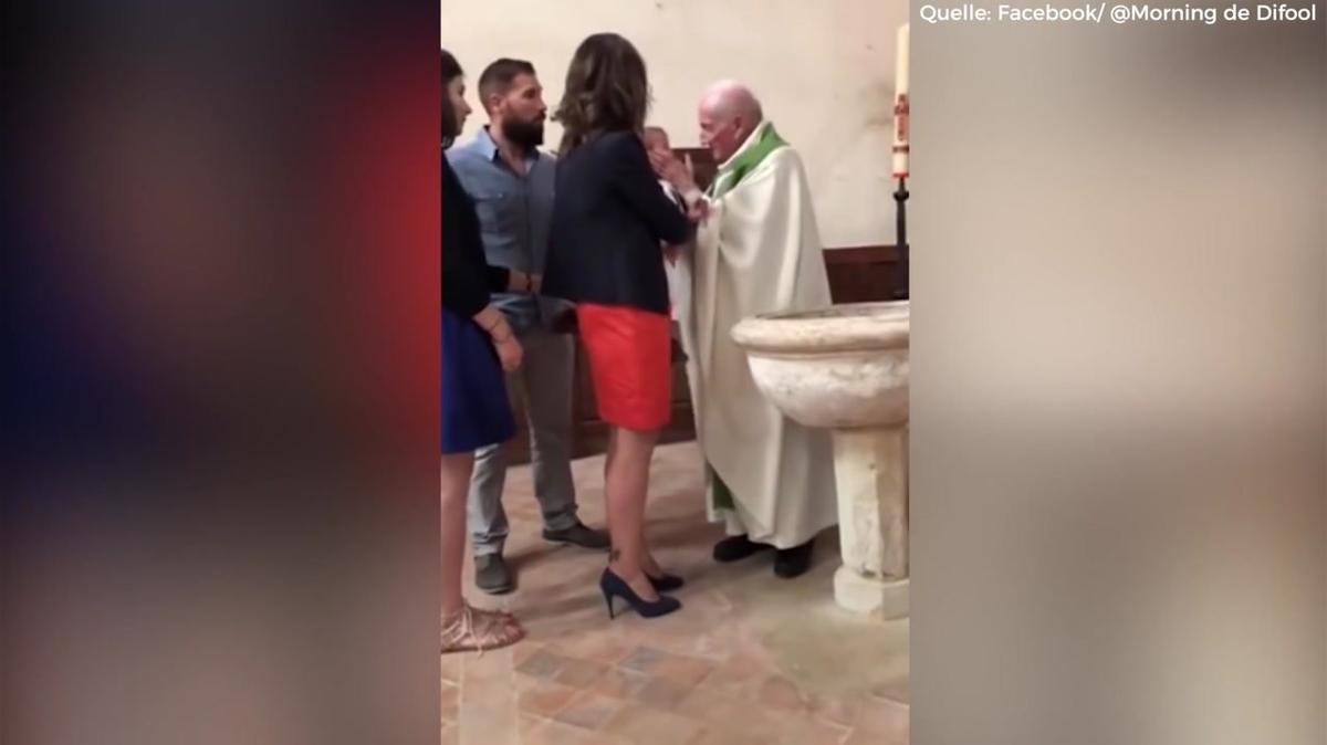Priester ohrfeigt Baby während Taufe