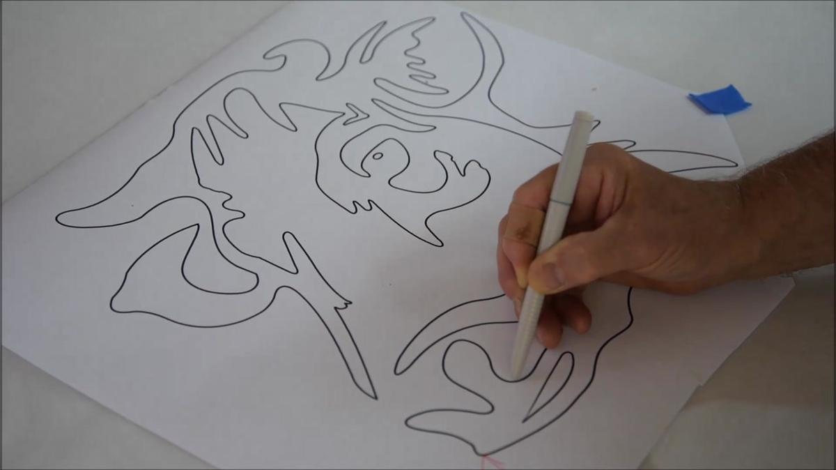 trace out a cow head profile  and cut it out on a co2 laser