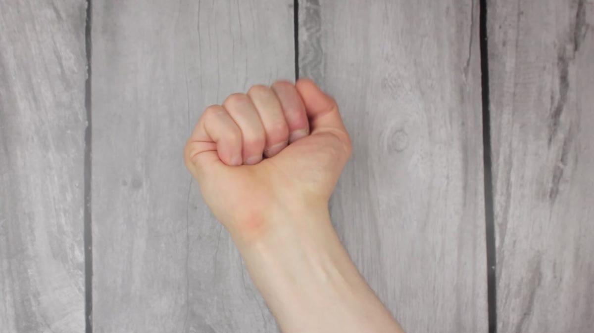 Hand wrist warm-up.Wrist joint of the hand warm-up movement.