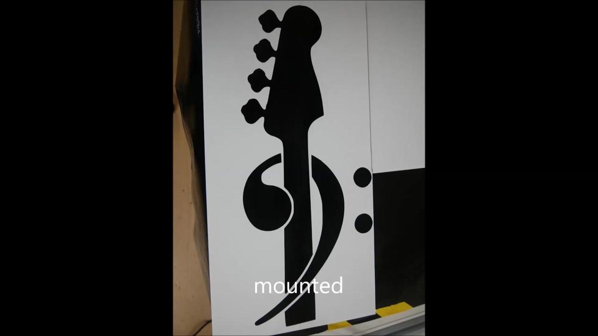 tracing out a guitar neck profile and music note