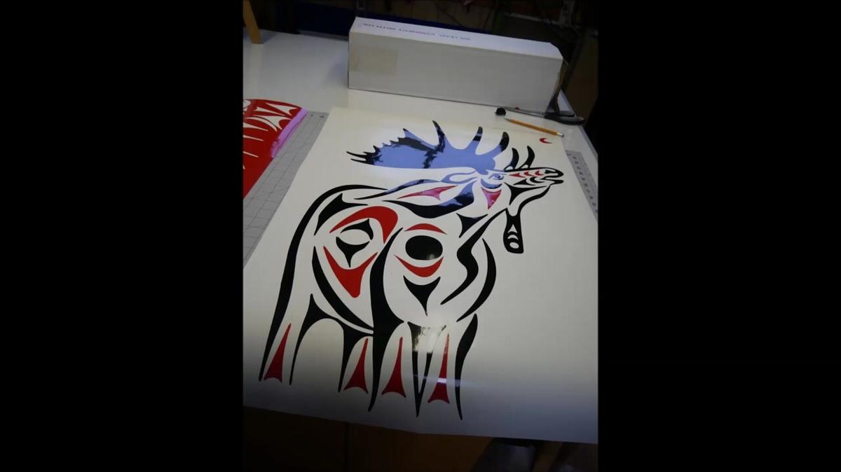 trace out a moose graphic and cut the parts out of red and black vinyl