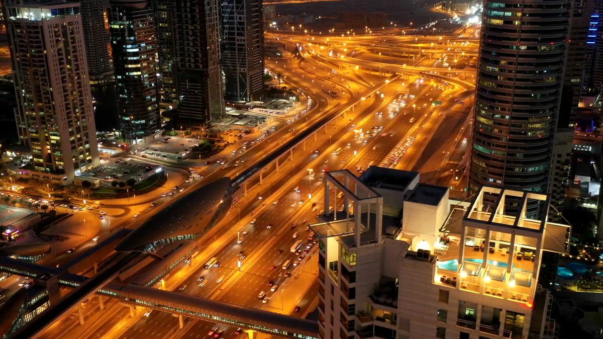 aerial hyperlapse of busy highway in dubai at night uae