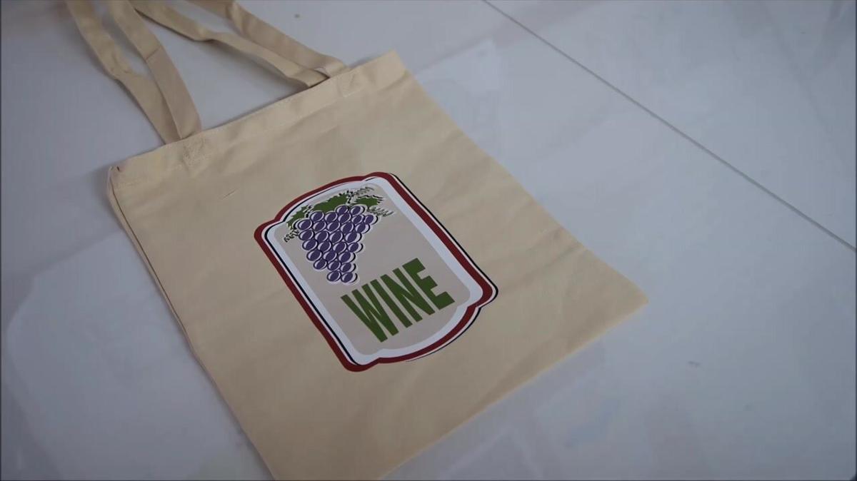 wine graphic traced, printed and heat transfer to a canvas tote bag