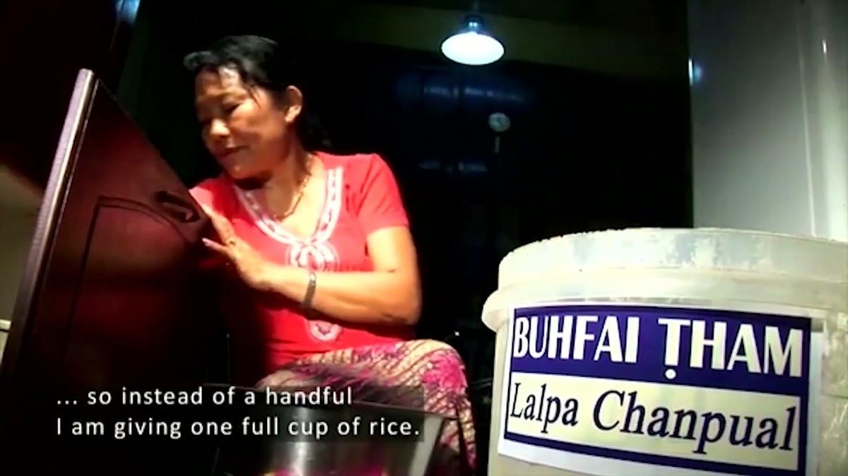 AR (Eg) - DUB - A Handful of Rice (2012)