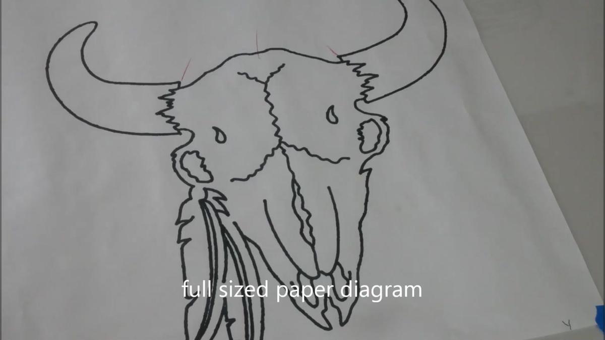 trace out a cow_skull and feather to produce a *.dxf file  for a cnc engrave