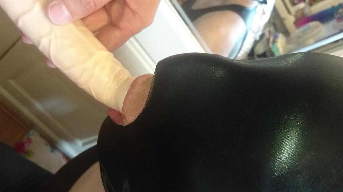 Hooded Slave bi sucking cock
