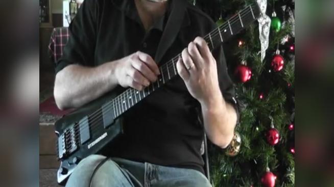 2 handed Guitarist T.W. without logo