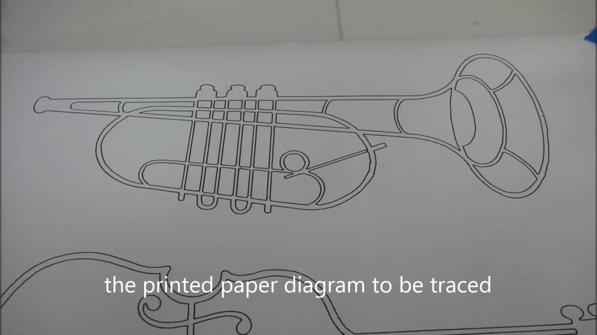 scroll saw pattern of a trumpet  digitized and cut on a CO2 laser