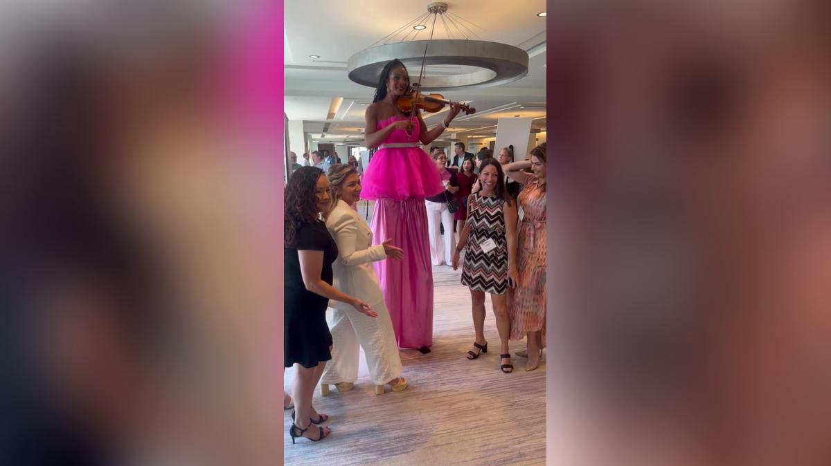 Violinist on stilts C.A.