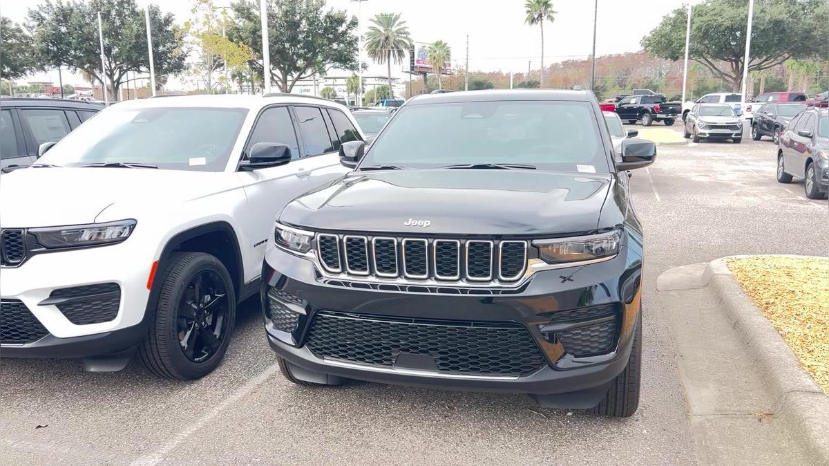 Julio's Grand Cherokee video by Walter/ Airport CDJ 407-541-6200