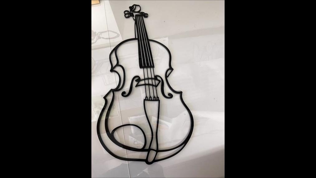 to trace out a violin profile and cut it out
