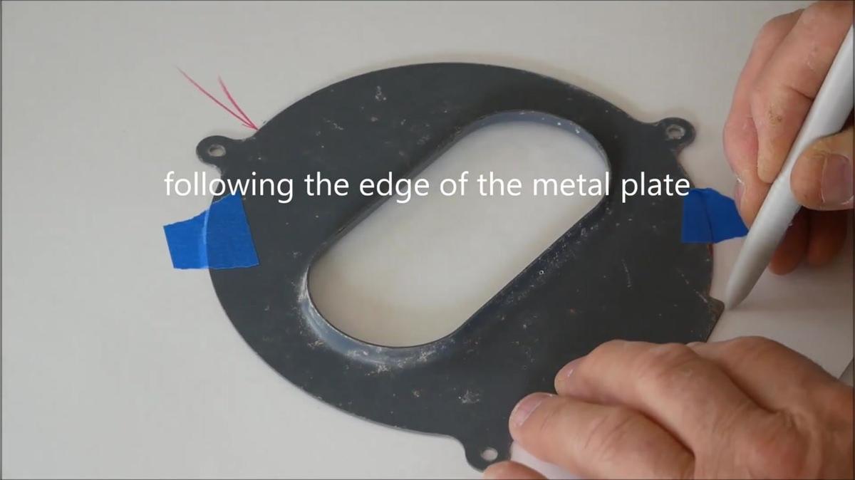 trace a metal part with bolt holes and check the fit
