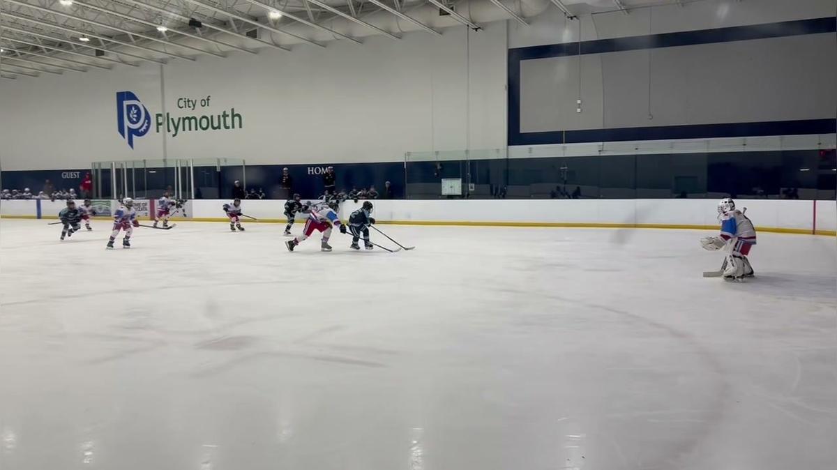 Luca Brooks scoring bkhd from knees